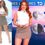 Norma Garcia presenting a very crisp, mesmerizing, professional weather forecast while wearing a grey miniskirt.