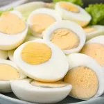Why does a green ring appear around hard-boiled eggs?