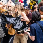 Jennifer Aniston gets fake oil thrown at her while filming ‘The Morning Show’: set photos